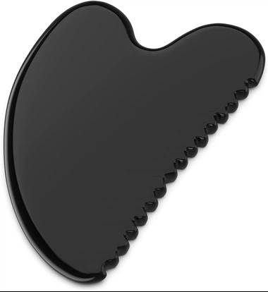 Alat pijat bian batu obsidian gua sha